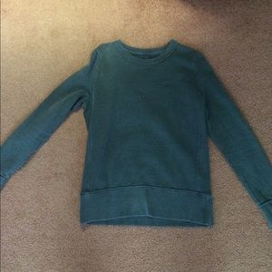 Blue/gray sweatshirt.