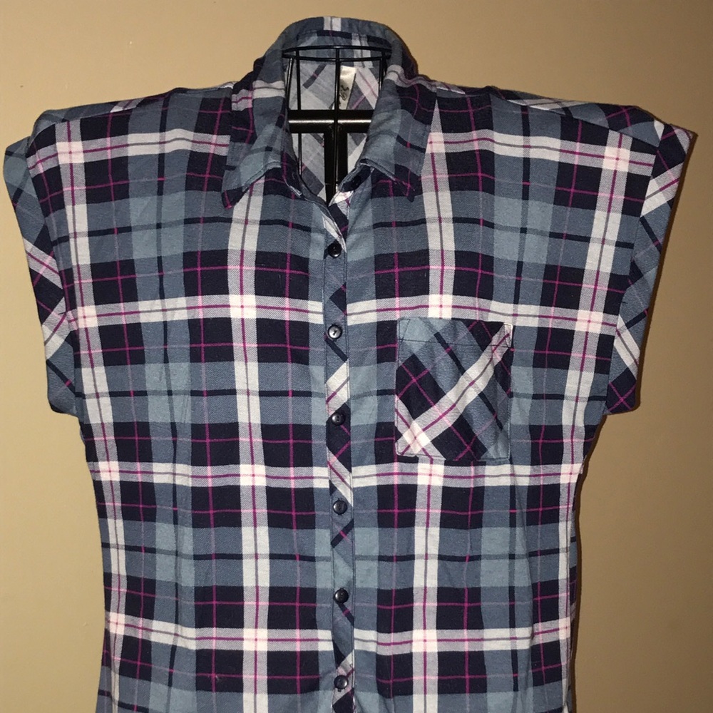 3 ladies flannel style print shirts.