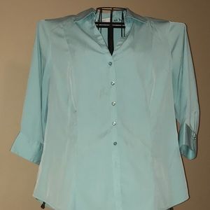 Three ladies blouses.