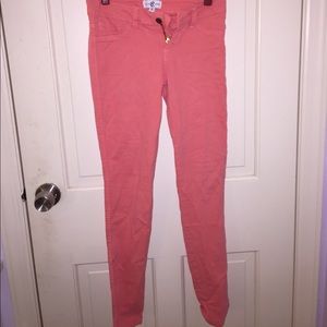 Salmon colored jeans