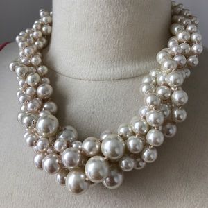 Multiple stand pearl necklace