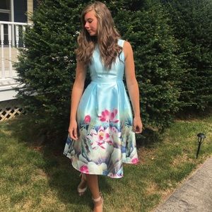 Light Blue dress with Floral Print on the skirt