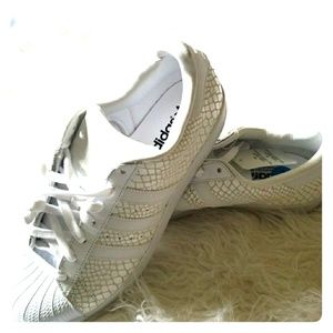 Brand new, never worn Adidas snakeskin tennis shoe