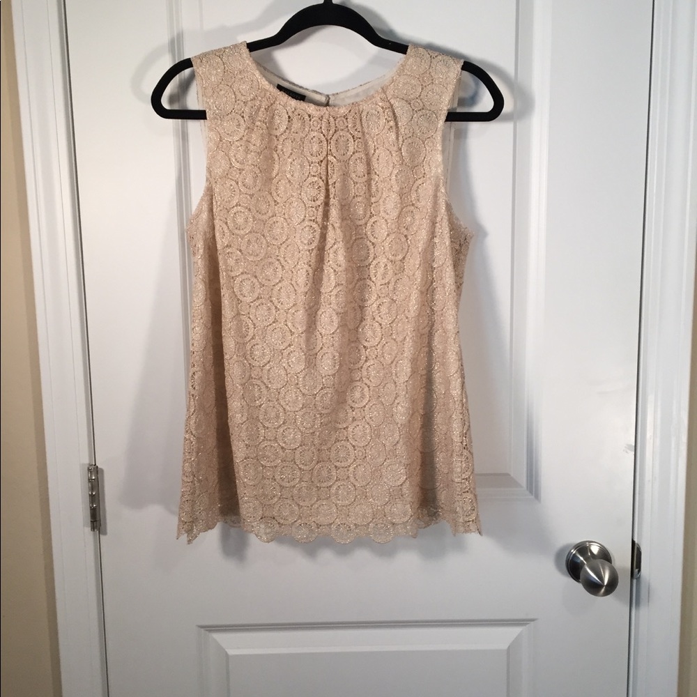 Beautiful gold and cream sleeveless blouse.