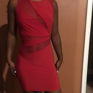A red midi sheer bodycon dress.