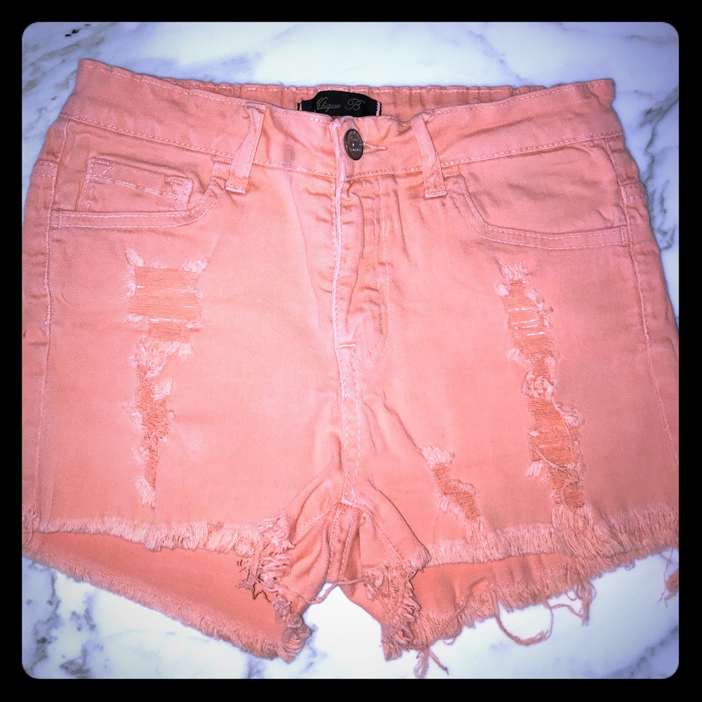 Tangerine denim cutoffs