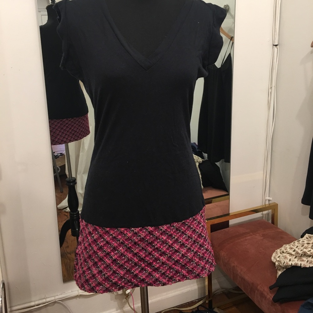 Black V-neck top with pink and black Boucle detail