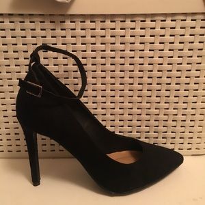 Black, closed toed heels with ankle strap