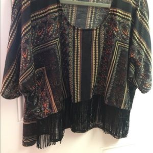 Cute top with fringed bottom!