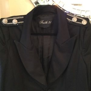 Crop jacket with embellishments .