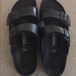 Black plastic Birkenstocks. Worn twice. Size 9.