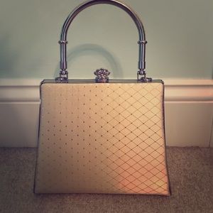 Small cream  purse with silver accents