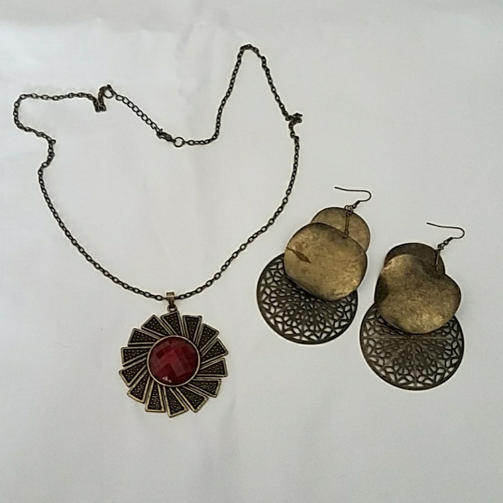 Necklace and earrings. Bronze color with dark red