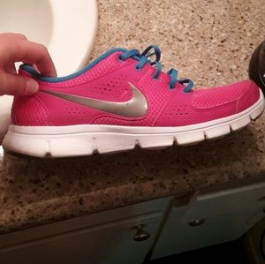 Pink and blue NIKE shoes