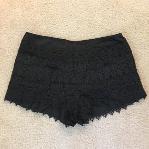 Sans Souci black lace shorts