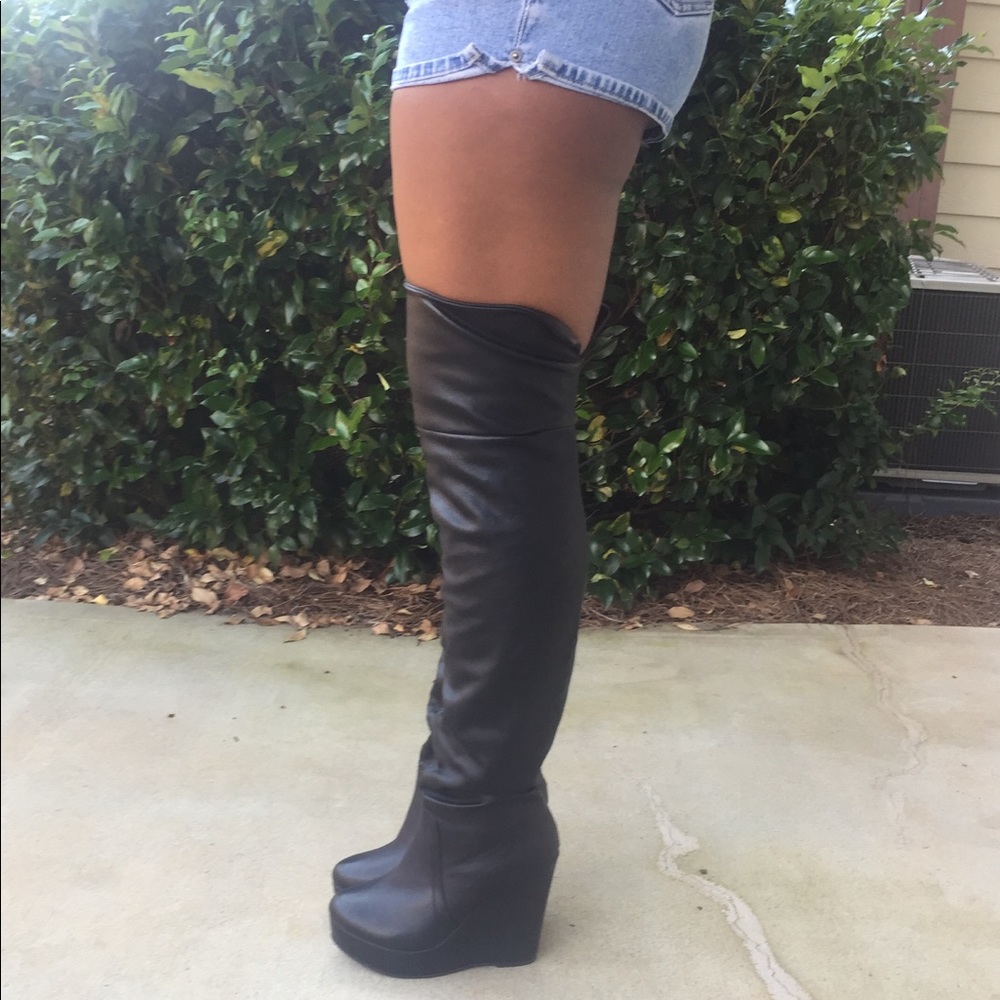 Over the knee wedge boots