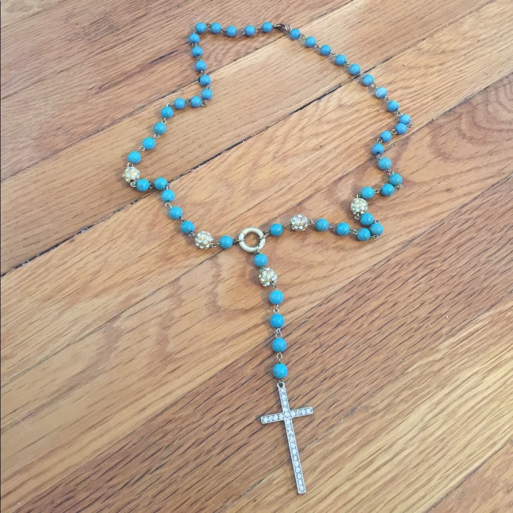 Turquoise and gold cross rosary necklace.