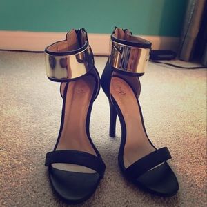 Black and gold heels