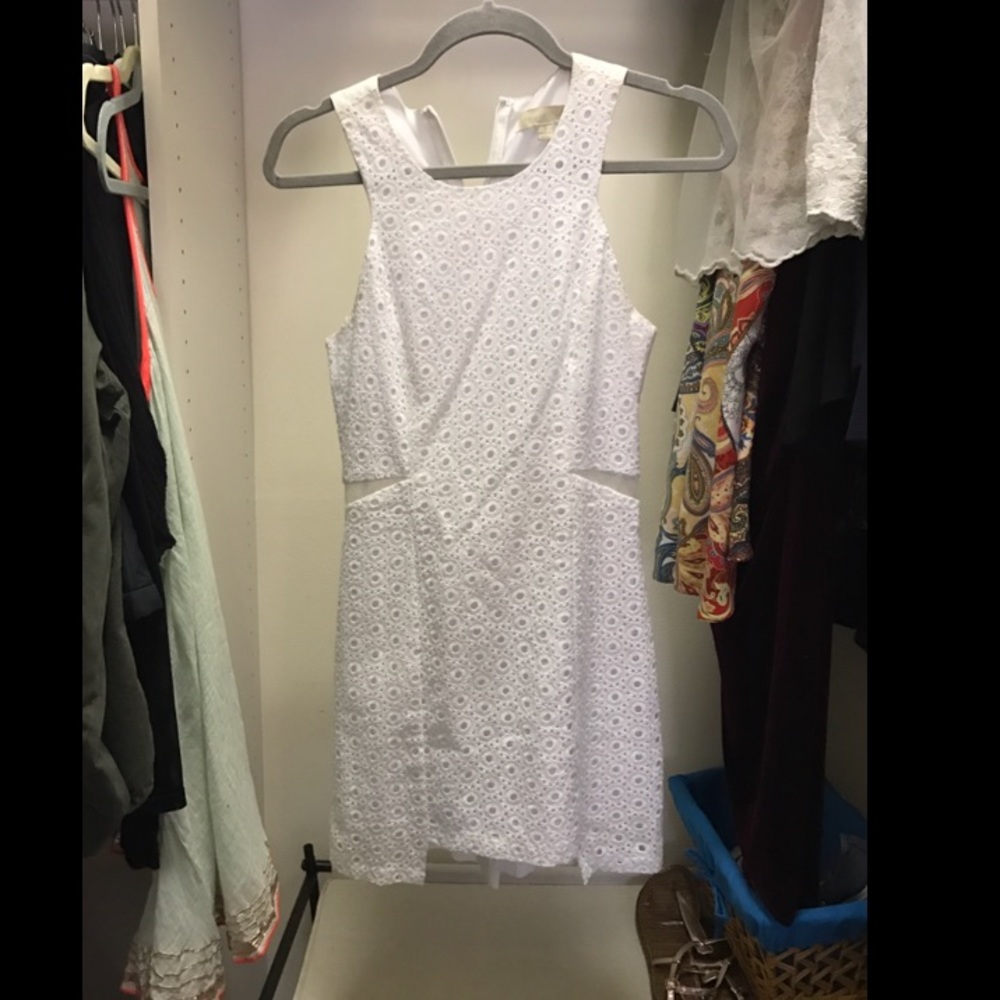 White lace dress with sheer cutouts
