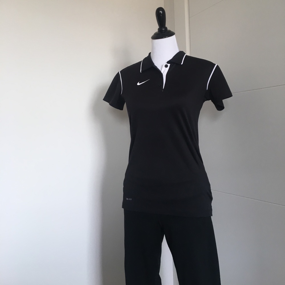Women's small black Nike polo with white accents