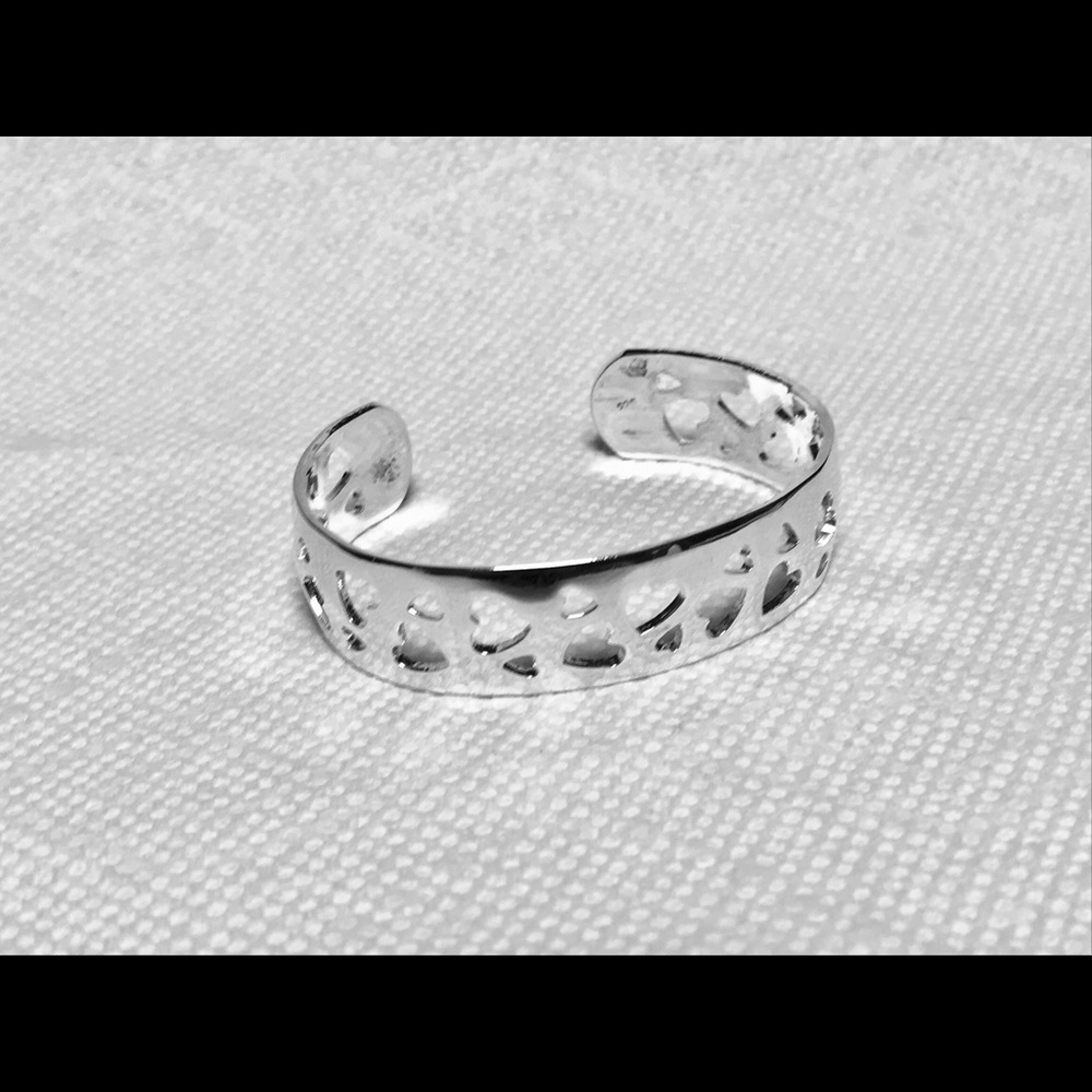 Silver Cuff Bracelet with Heart Cut-Outs