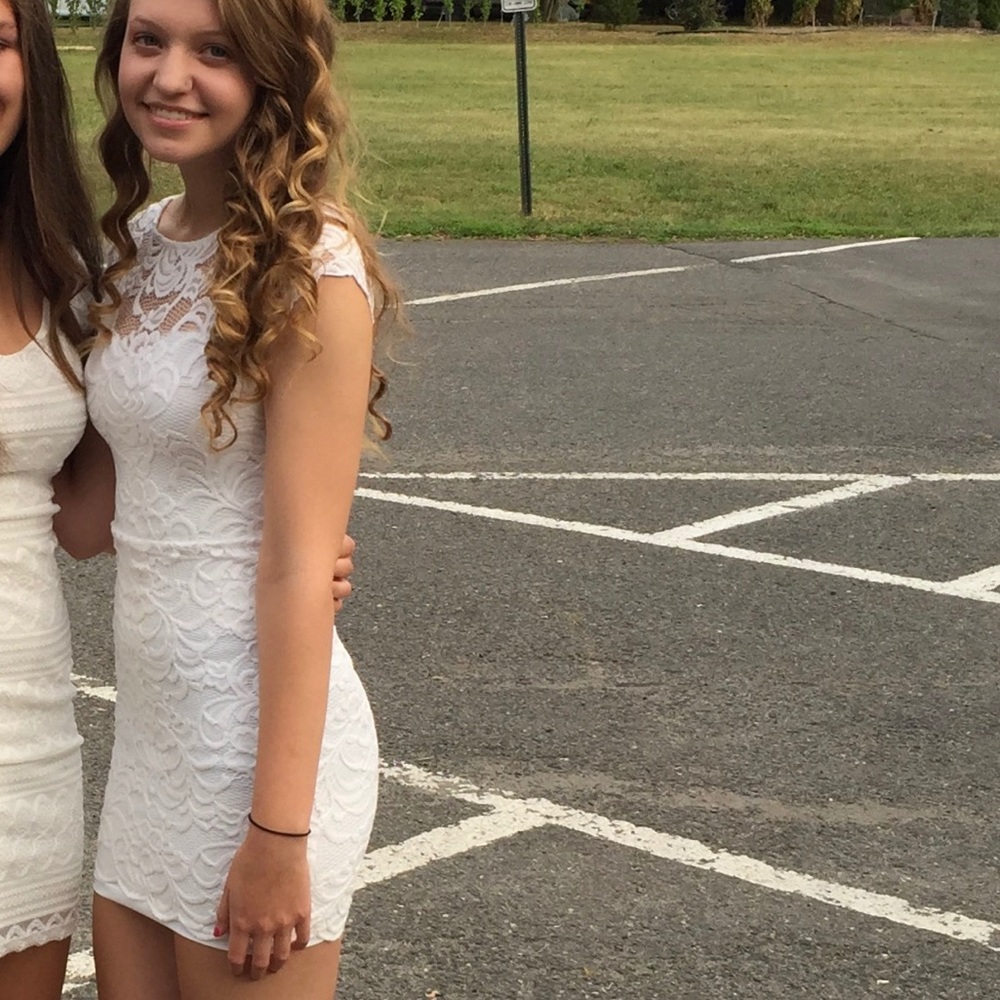 Lace, form fitted, white dress