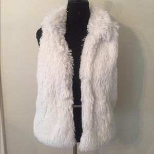 White faux fur vest