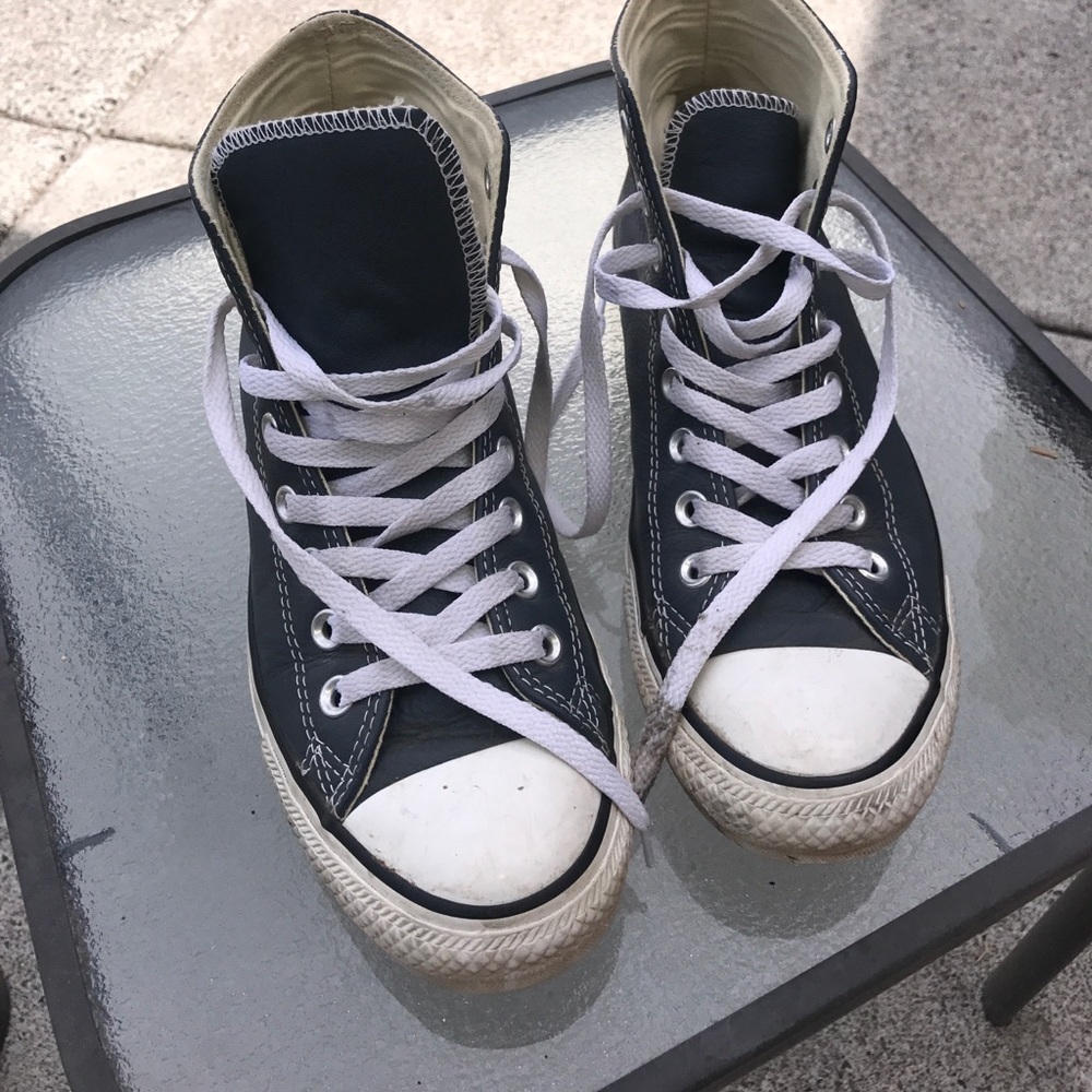 Gray leather converse