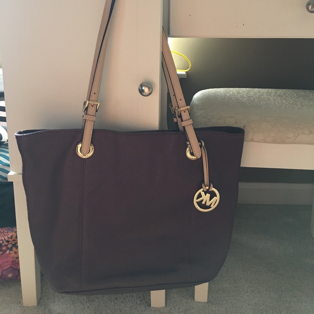 Michael Kors plum colored soft leather purse