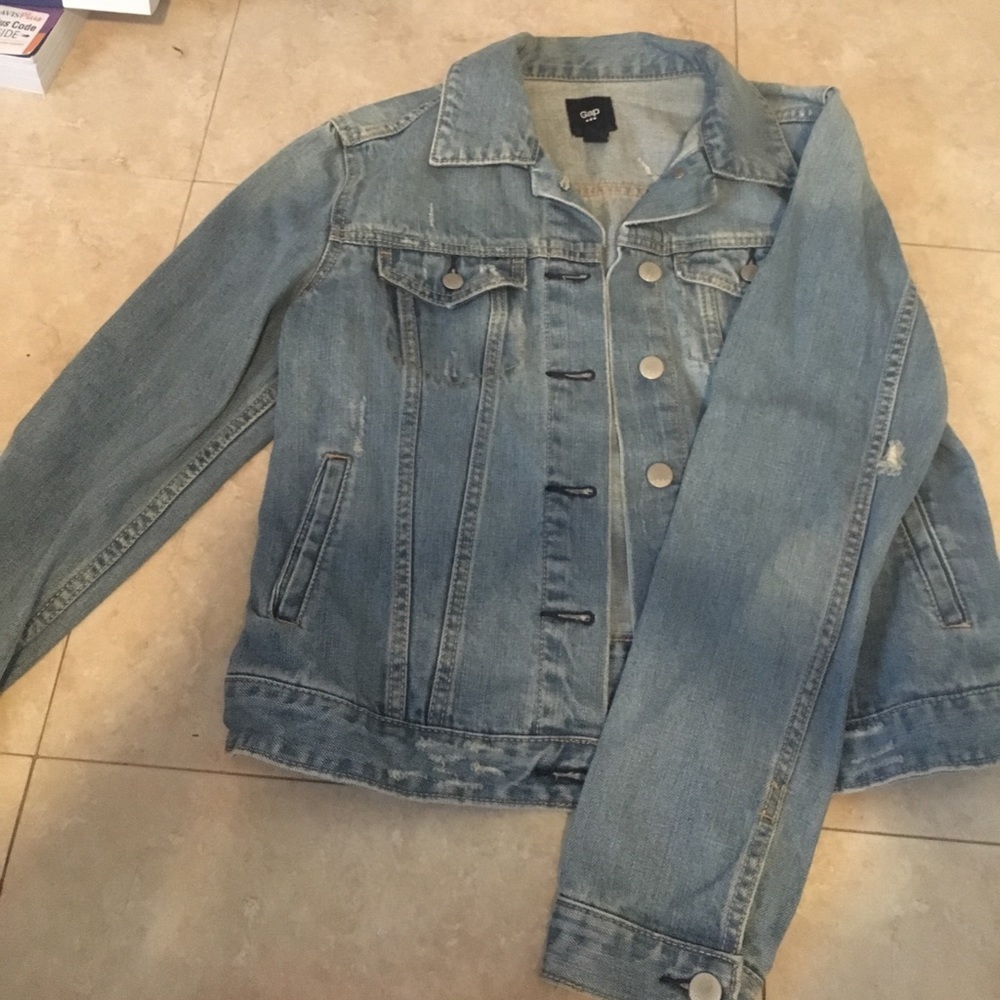 Distressed denim jacket