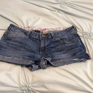 Distressed Arizona shorts.