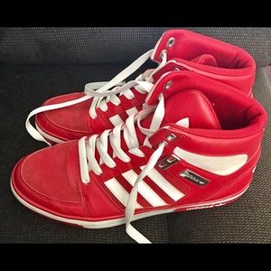 red and white adidas high tops