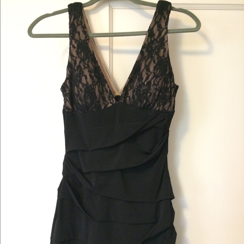 Black tight fitted vneck lace dress