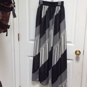 Sheer deco style print skirt.
