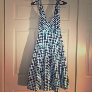 A polka dot blue dress with a pleated flair 💙