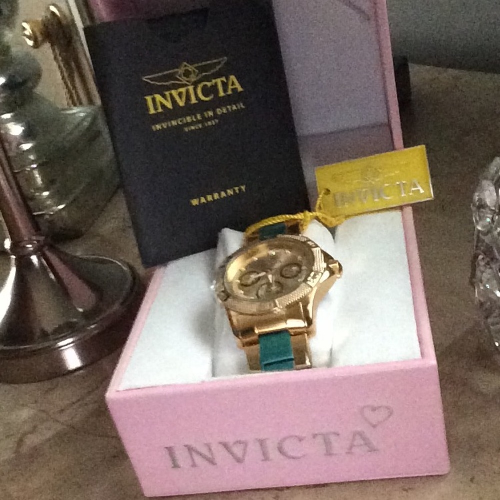 A new Invicta woman's angel quartz stainless