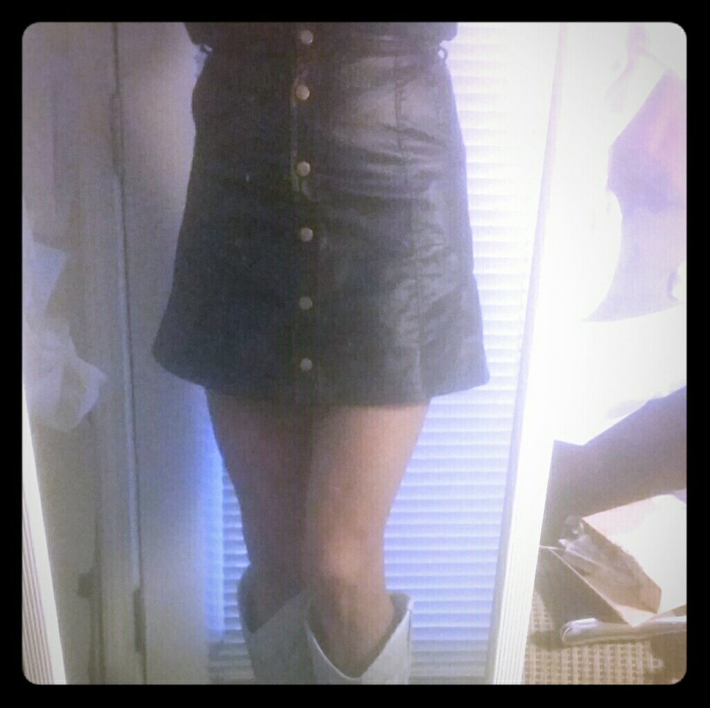 Wet-look/leather-look front button-up skirt.