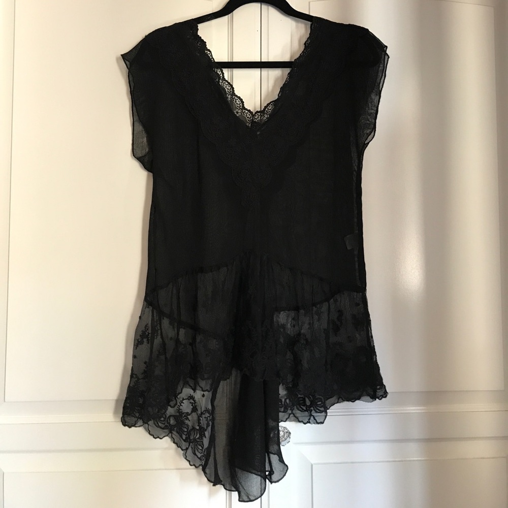 Lacy black top, never worn, very cute!!!