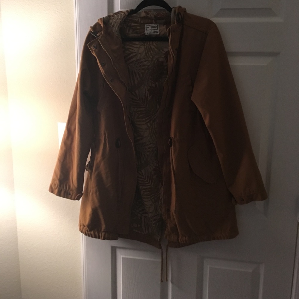 beige longline fish tail parka