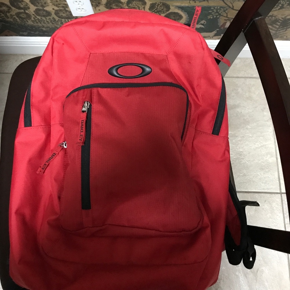 Oakley used backpack used last school year. Red.