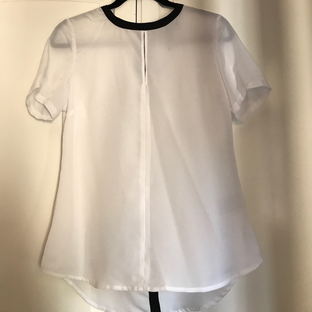 Black and white blouse ! Never worn!