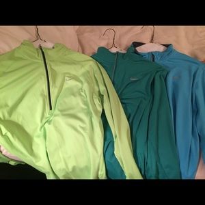 Nike 1/4 zip pullovers