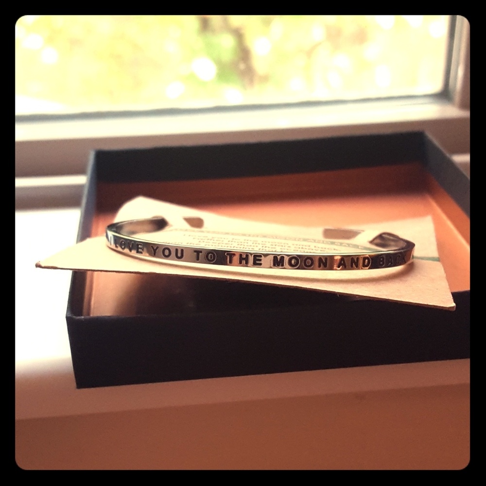 MANTRABAND cuff bracelet.