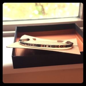 MANTRABAND cuff bracelet.