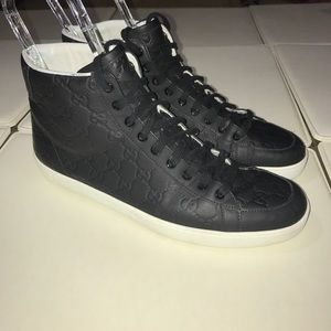 Men's Gucci shoes embossed with GG logo