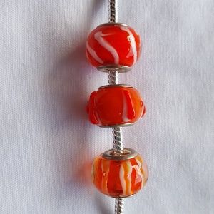 Bracelet with orange Murano glass beads