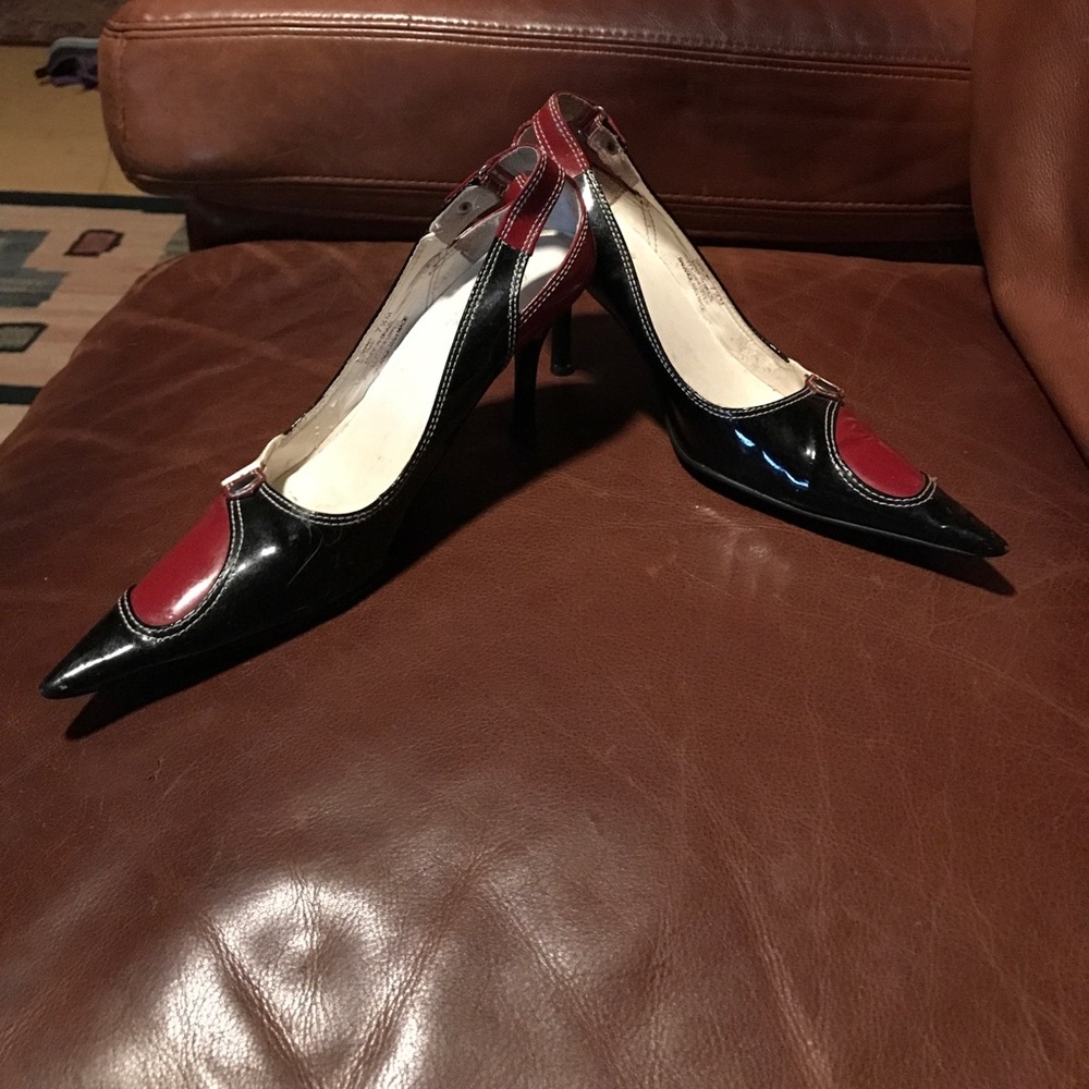 Red, white and black patent Carlos Santana pumps