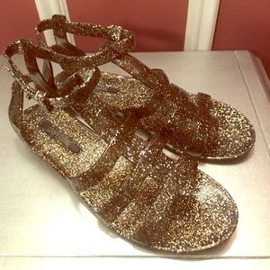 Size 37 (US 7) Gladiator gold glitter jellies!