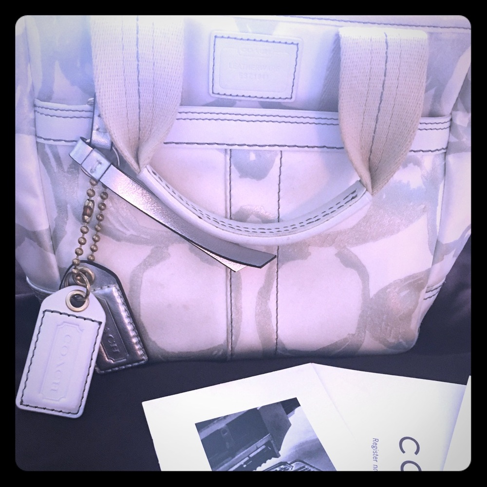 White and silver authentic Coach logo purse