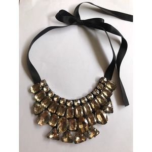 Fashion statement necklace with gold embellishment